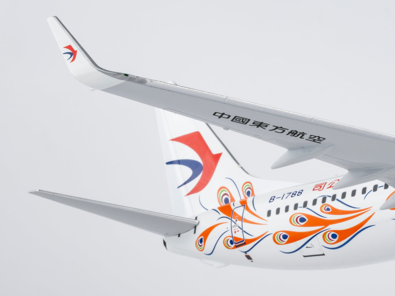 NG Models China Eastern Airlines "Orange Peacock" livery Boeing 737-800/w B-1788 1/200 Aircraft Scale Model